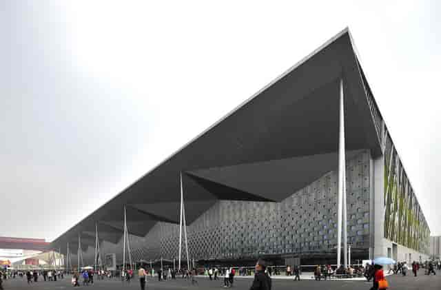 Exhibition Hall 4, Shanghai: modern convention center with angular roof for events.