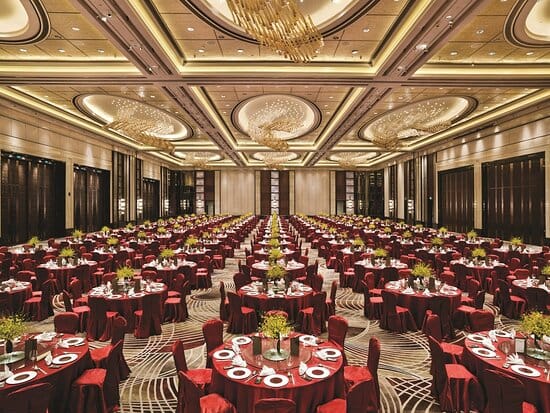 Grand Shanghai Ballroom with burgundy tables, perfect for elegant galas and corporate events.