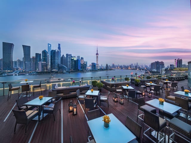 Rooftop ballroom with panoramic Shanghai skyline, perfect for upscale events and receptions.