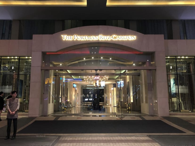 Elegant entrance of The Portman Ritz-Carlton, Shanghai for luxury events and meetings.