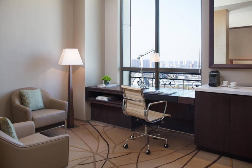 Meeting space with natural light at Courtyard Shanghai for productive team sessions.