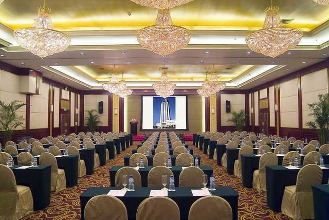 Grand Ballroom at Holiday Inn Shanghai Pudong, elegant setup for conferences and events.