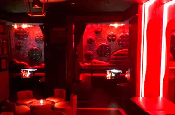 Intimate Leather Room at 141 Park Lane, perfect for exclusive events and cocktail parties.