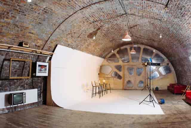 Industrial event space with exposed brick walls for workshops and photo shoots.