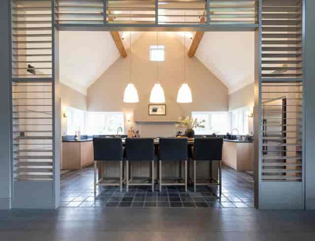 Spacious modern meeting space with high ceilings in Luxury Boltholes for events.