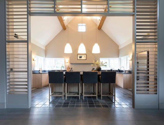 Spacious modern meeting space with high ceilings in Luxury Boltholes for events.