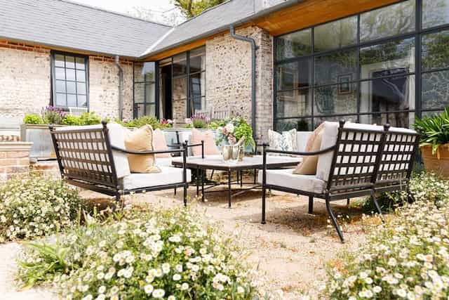 Charming outdoor seating in Courtyard Garden for networking events and casual meetings.