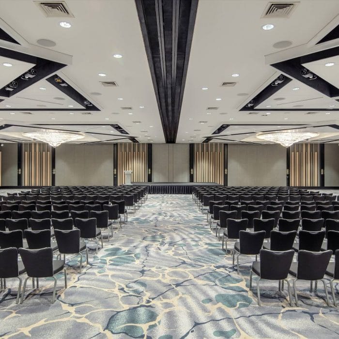 Elegant event space in Raffles City for conferences with modern decor and ample seating.