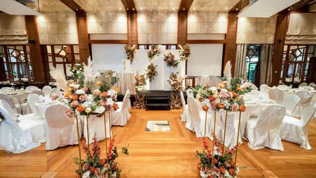 Saffron Ballroom at Sofitel Singapore, elegant wedding venue with floral decor.