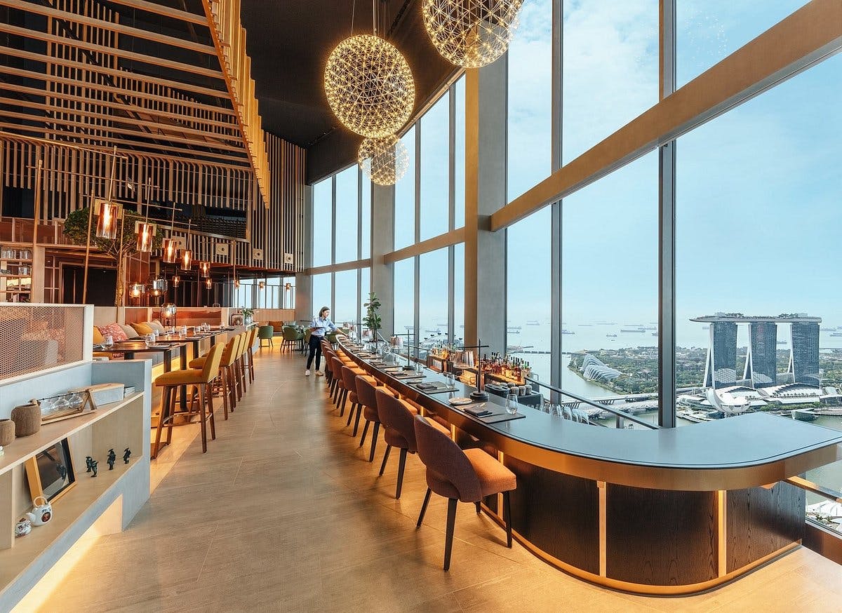 SKAI Suites at Swissotel The Stamford, modern venue with skyline views for corporate events.
