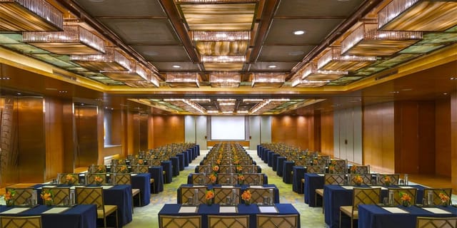 Oriental Ballroom at Mandarin Oriental, Singapore, set for a corporate event with floral decor.