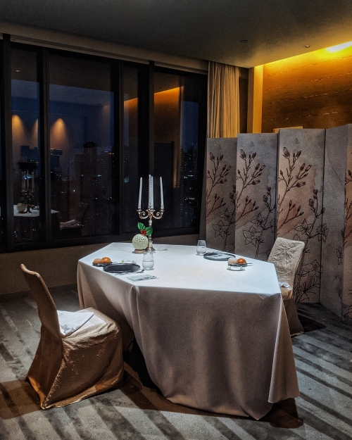 Elegant dining table at Nest at One Farrer, perfect for exclusive events and corporate gatherings.