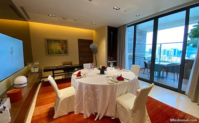 Elegant meeting space at Nest at One Farrer with round table, ideal for events and gatherings.
