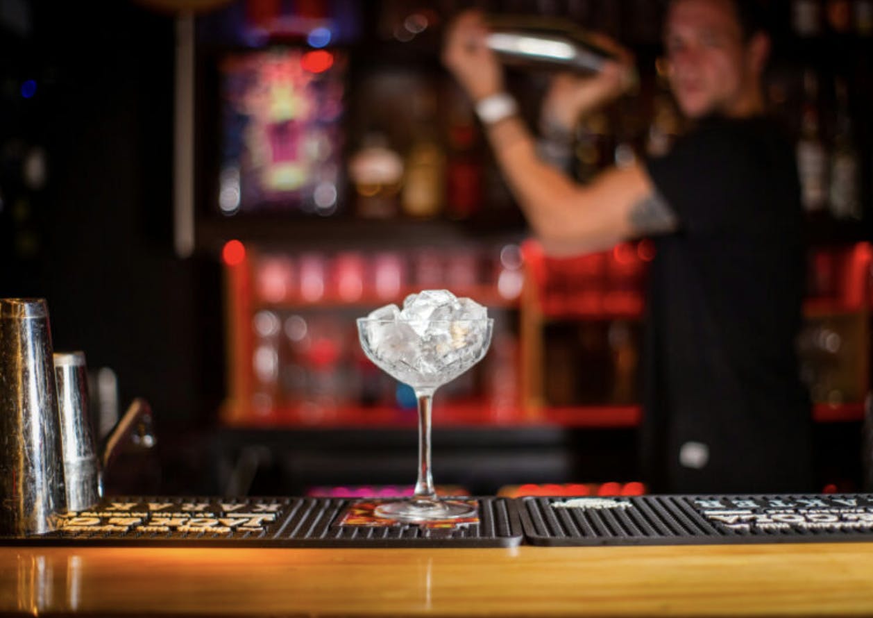 Cocktail setup at corporate event in Ballerz, showcasing ambiance and guest engagement.