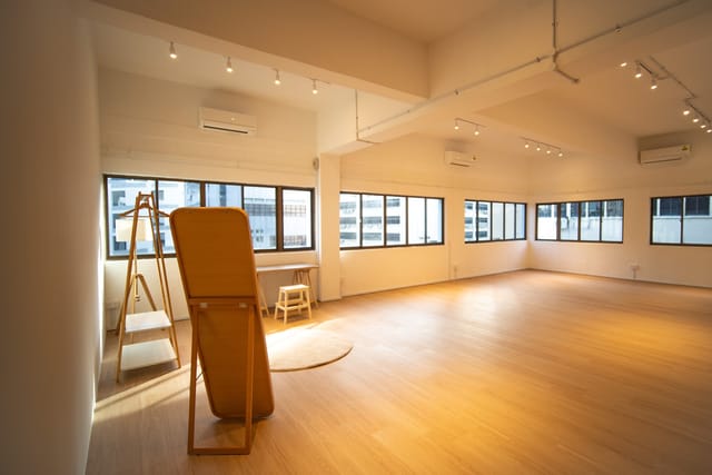 Bright, spacious event space with large windows for workshops and meetings at The Teahouse Studio.
