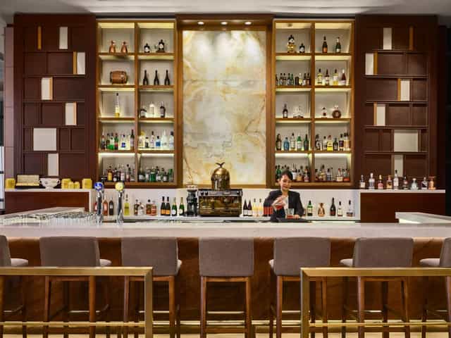 Stylish bar at Paradox Singapore Merchant Court, perfect for networking events and social gatherings.