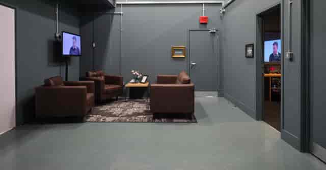Modern minimalist meeting space in Studio EC4, perfect for hybrid events and discussions.