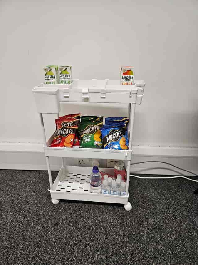 Individual counselling snack station with McCoy's crisps and juice boxes at Basepoint Dartford.
