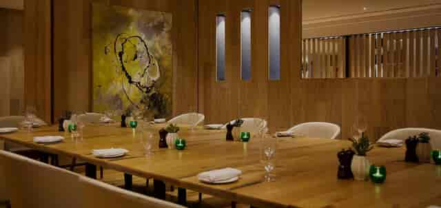 Amalfi Dining Room with elegant table setting for intimate meetings and exclusive events.