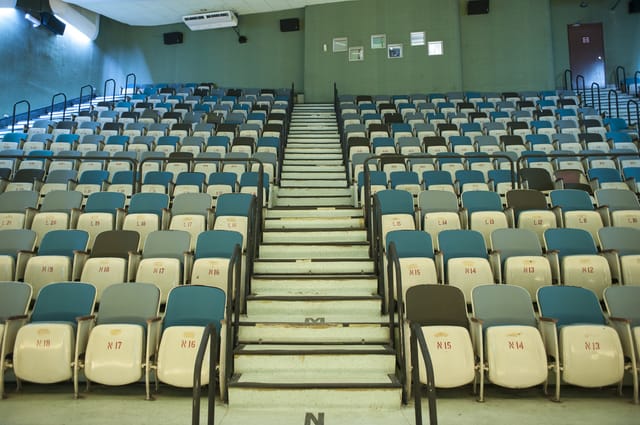Golden Mile Green Room auditorium with tiered seating for presentations and lectures.