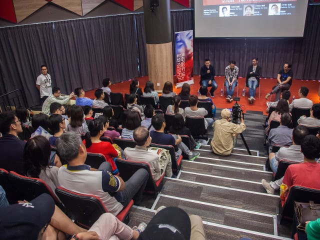 Panel discussion in Main Hall at *SCAPE, featuring engaged speakers and audience interaction.