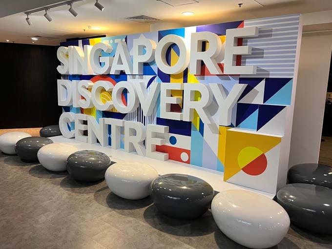 Vibrant welcome area in Singapore Discovery Centre for meetings and events.