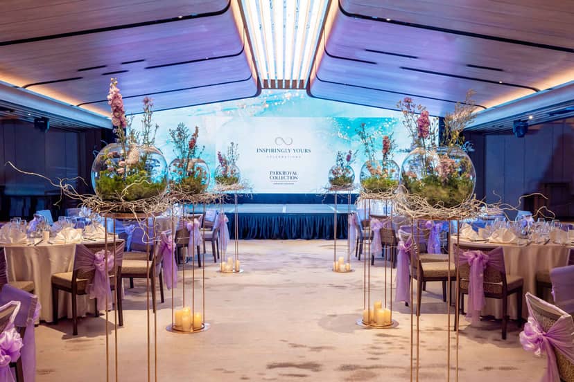 Atrium Ballroom at PARKROYAL: elegant event space with floral decor for upscale gatherings.