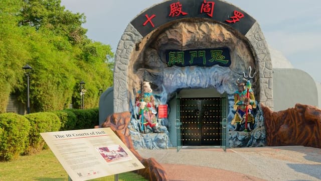 Sculpture Garden entrance at Haw Par Villa, vibrant cave design for themed events.