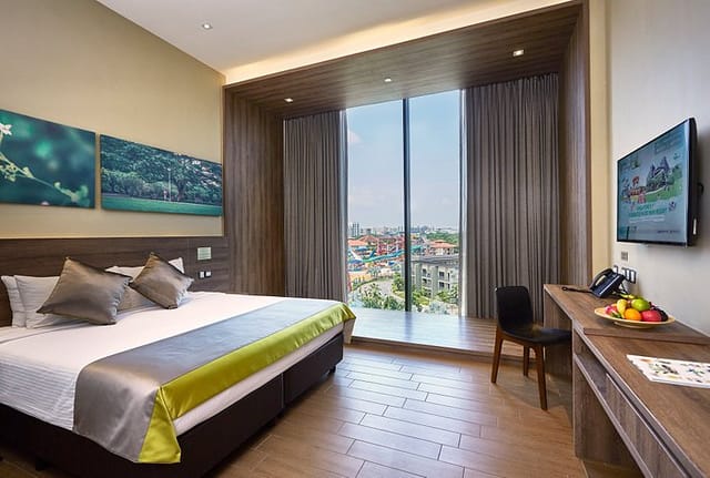 Modern hotel suite with natural light, ideal for business travel and events.