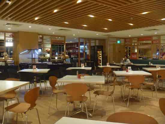 Modern dining area in Ibis Singapore, perfect for networking events and gatherings.