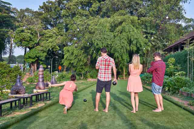 Outdoor brunch at Open Farm Community with lawn bowling for team-building events.
