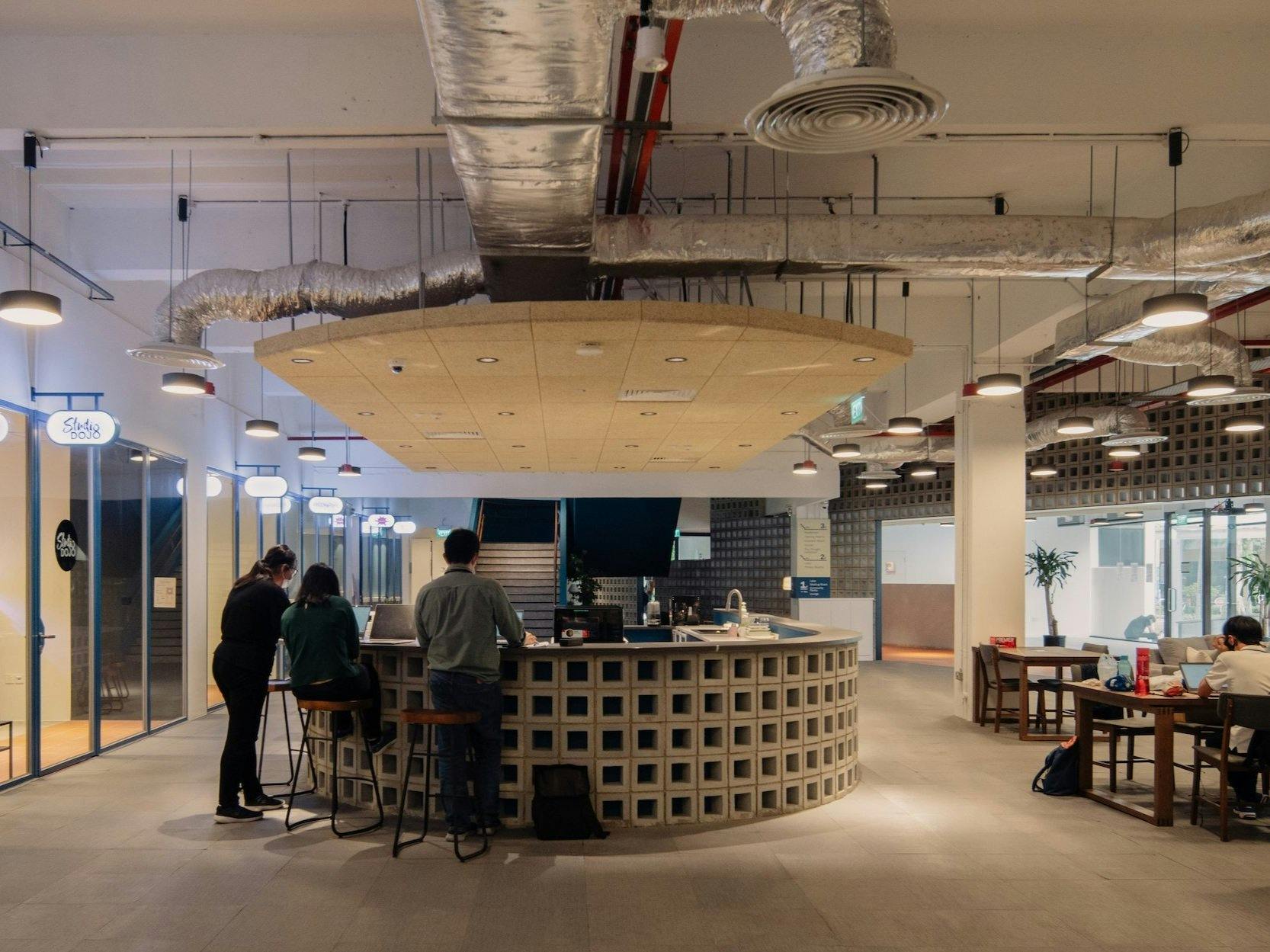 Modern open-concept workspace in The Atrium, perfect for networking events and meetings.