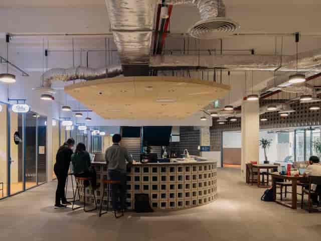 Modern open-concept workspace in The Atrium, perfect for networking events and meetings.