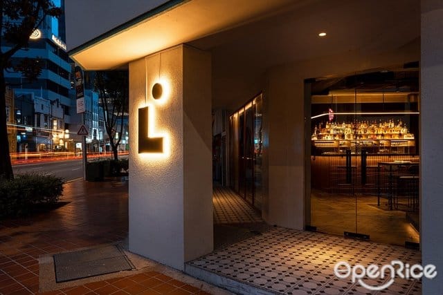 Modern LUMO Bar Restaurant entrance with sleek architecture, perfect for upscale events.