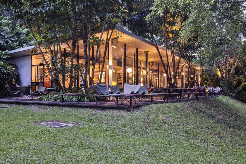 Modern PS.Cafe venue with glass facade, perfect for outdoor events and gatherings.
