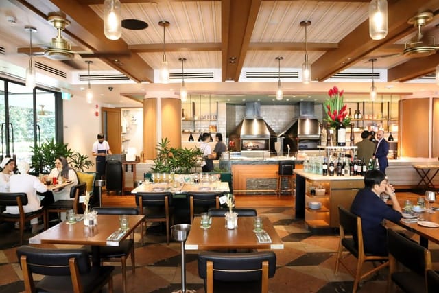 Modern restaurant venue with stylish decor, ideal for events and meetings.