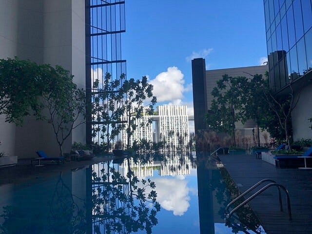 Modern pool area at Oasia Hotels, ideal for upscale outdoor events and networking.