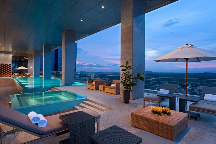 Luxurious rooftop pool at Oasia Hotels, perfect for upscale events and networking.