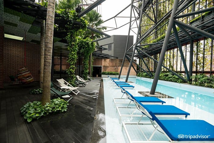 Modern pool area at Oasia Hotels, perfect for networking events and casual meetings.