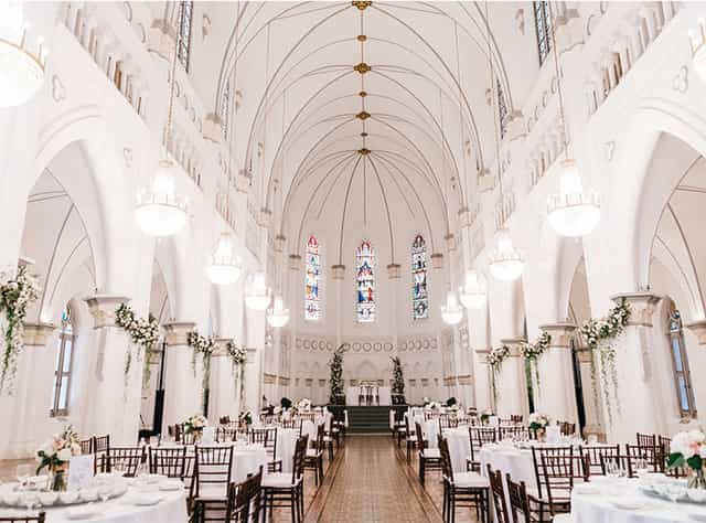 Elegant CHIJMES event space with high ceilings, perfect for weddings and gatherings.