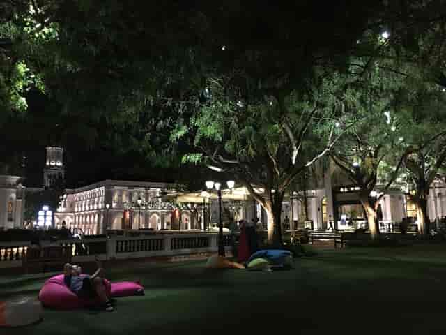 Vibrant outdoor event space at CHIJMES with cozy bean bags for gatherings.