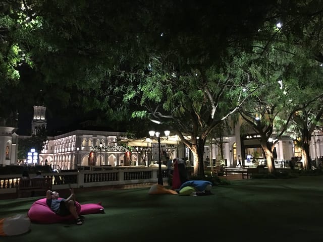 Vibrant outdoor event space at CHIJMES with cozy bean bags for gatherings.