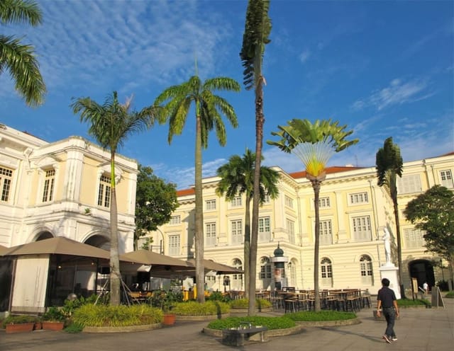 Riverfront Forecourt at Asian Civilisations Museum, ideal for outdoor events with lush palm trees.