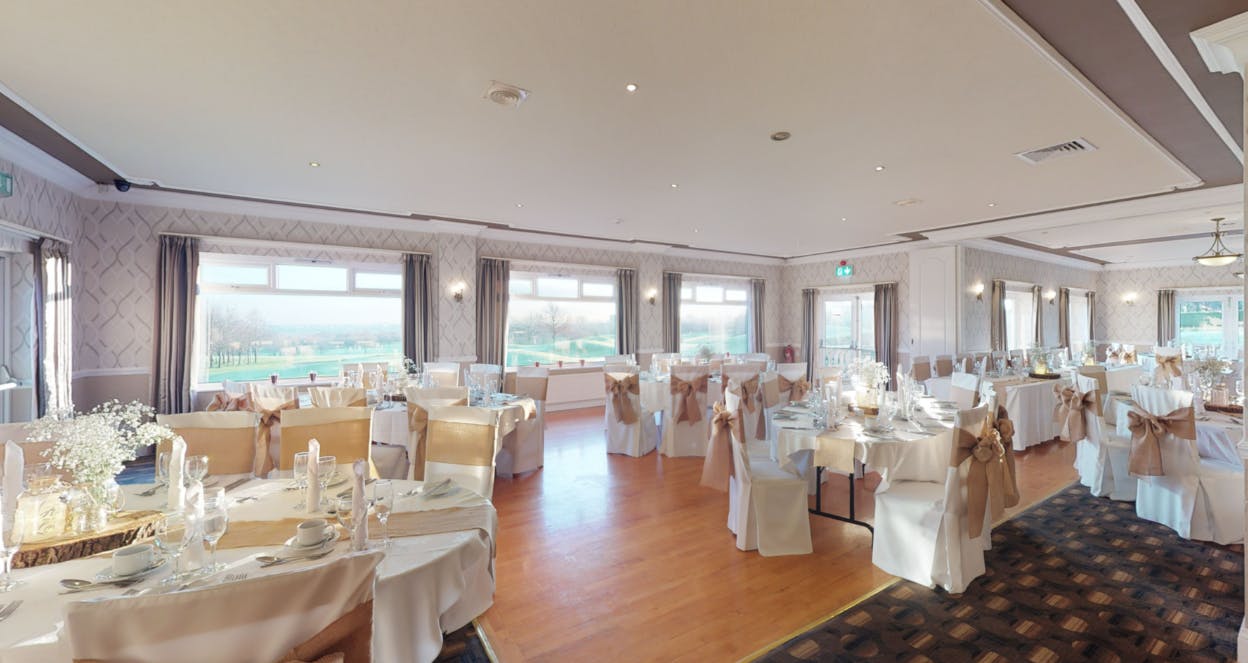 Elegant dining setup at The Manor Golf Club for weddings and corporate events.