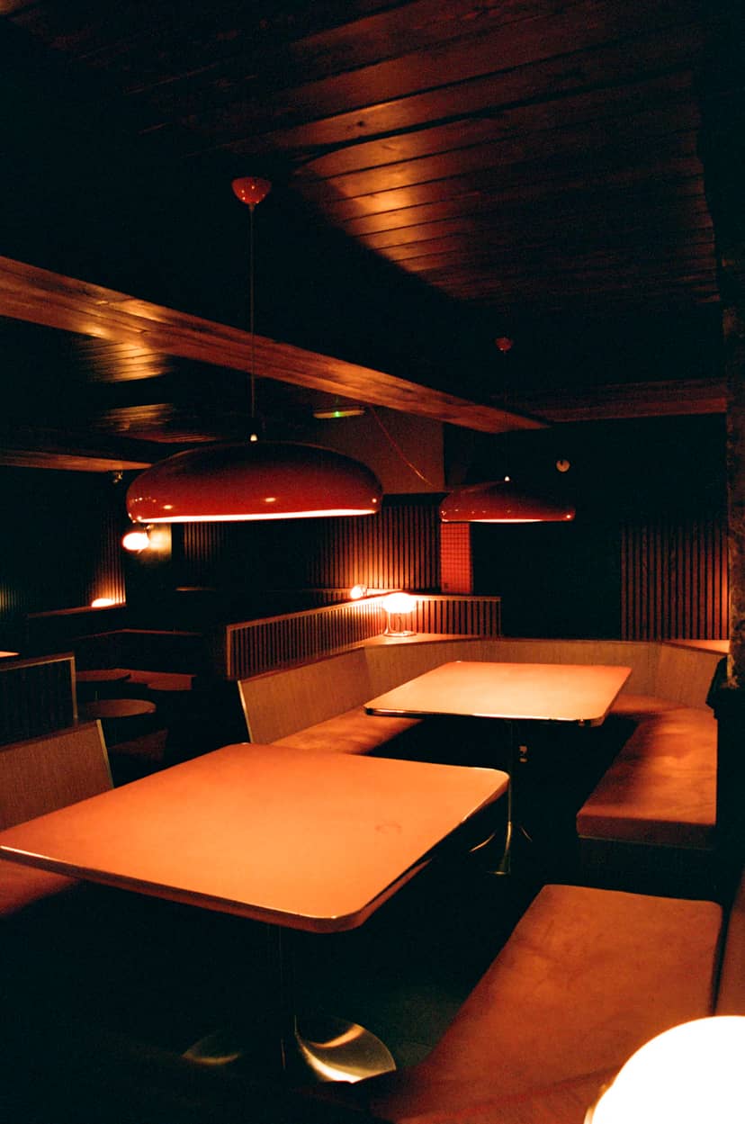 Stylish Marquee Moon Basement with red lights, perfect for networking events and gatherings.