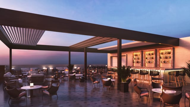 Stylish rooftop bar at The Oberoi, New Delhi, ideal for upscale events and cocktail receptions.