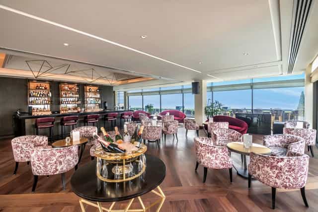 Elegant event space at The Oberoi, New Delhi with panoramic views for cocktail receptions.