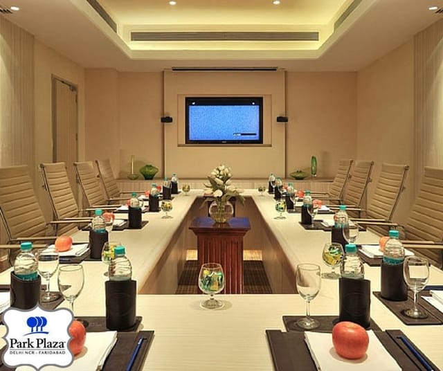 Conference Hall in Park Plaza New Delhi with long table, ideal for professional meetings.