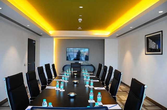Modern conference hall with ergonomic chairs for professional meetings and presentations.