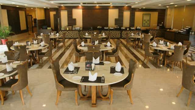 Elegant dining area at Udman Hotels, perfect for events and meetings.